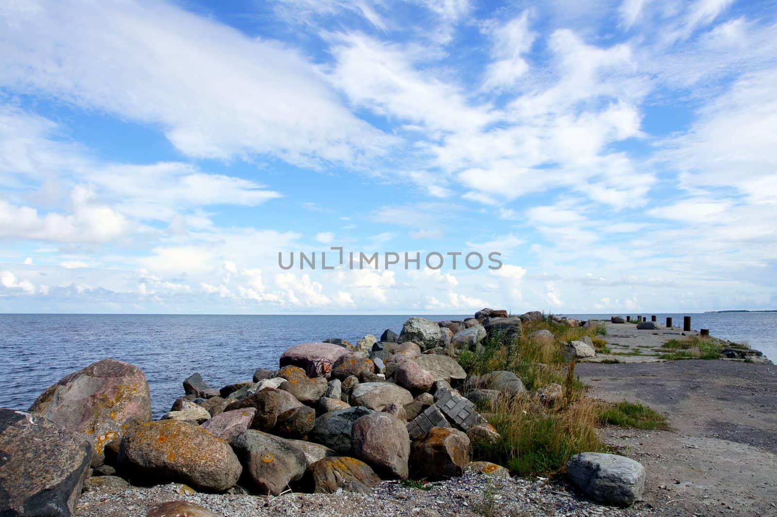 Stones on a background of the cloudy sky