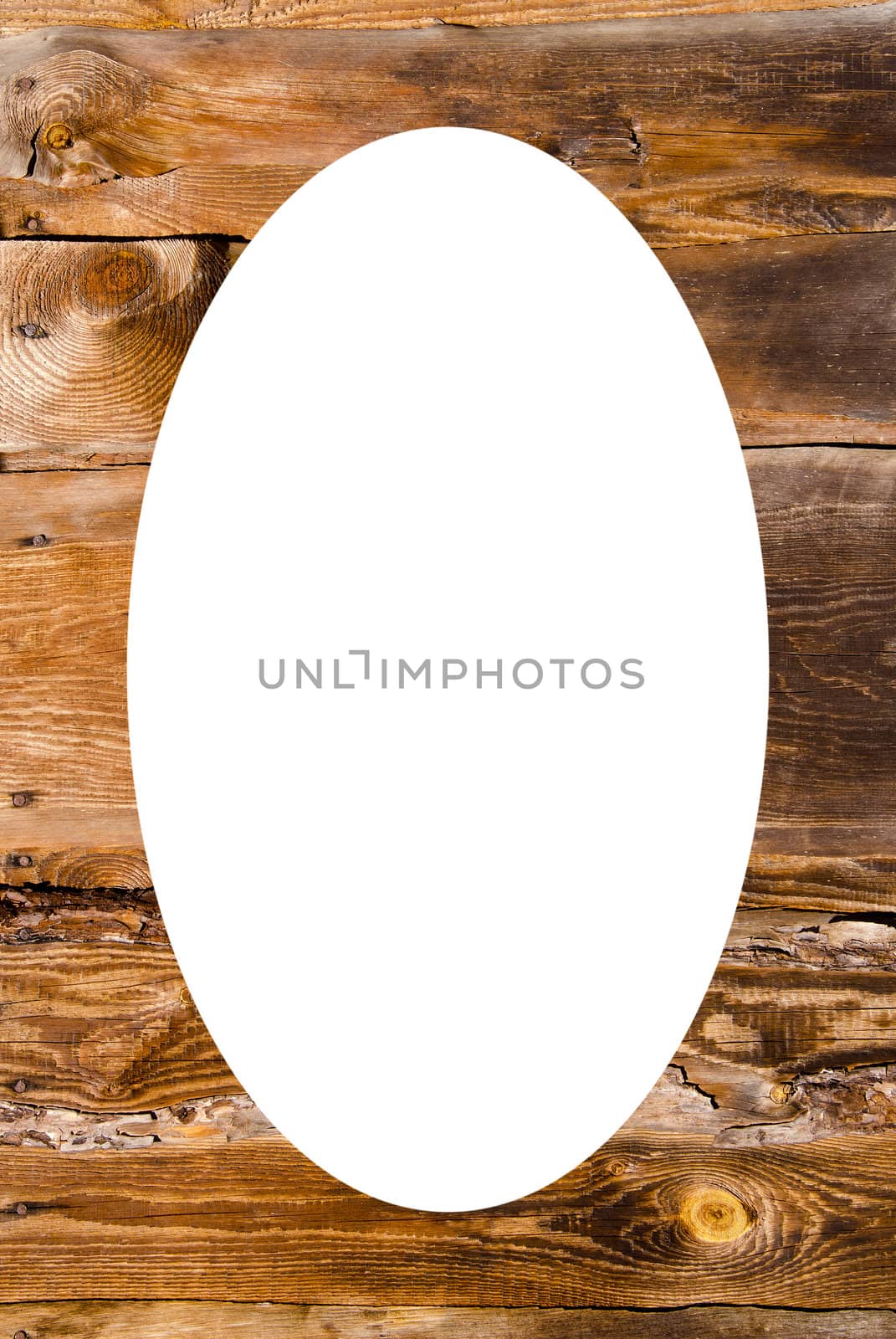 Old wooden building wall and white oval in center by sauletas