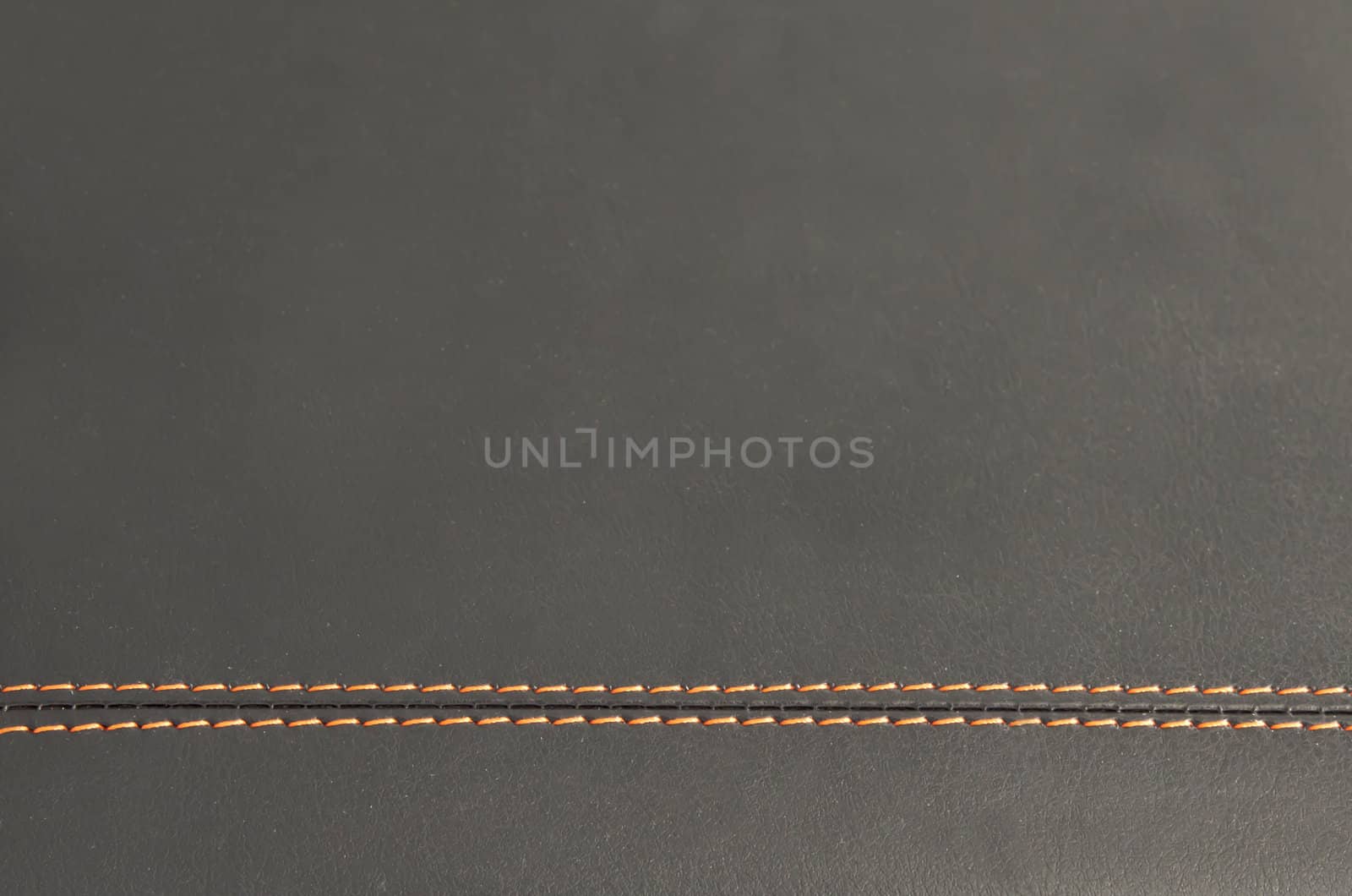 horizontal stitched leather background or texture