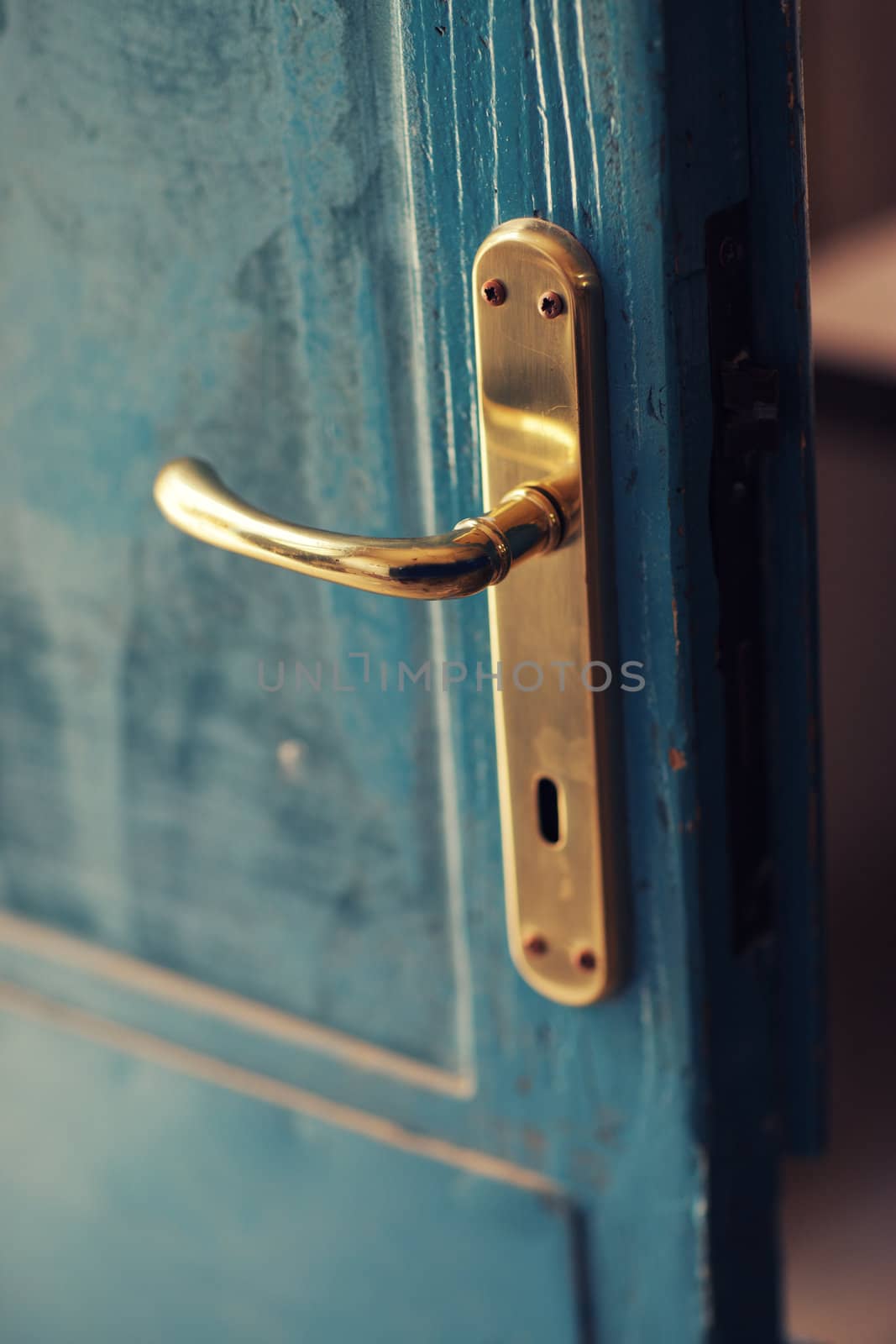 Door opening in a misterious room, handle close up