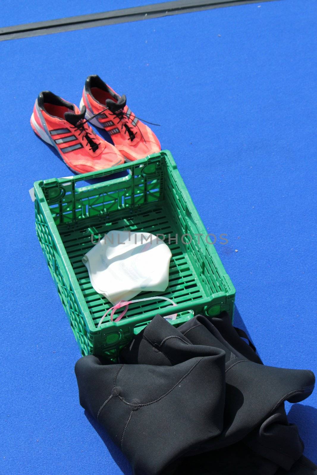 Transition space with running shoes, box and swimming clothes for athlet at the 2012 International Geneva Triathlon, Switzerland.