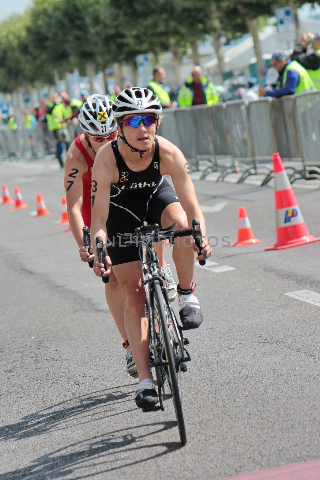 Two unidentified female cyclists at the 2012 International Geneva Triathlon, Switzerland.