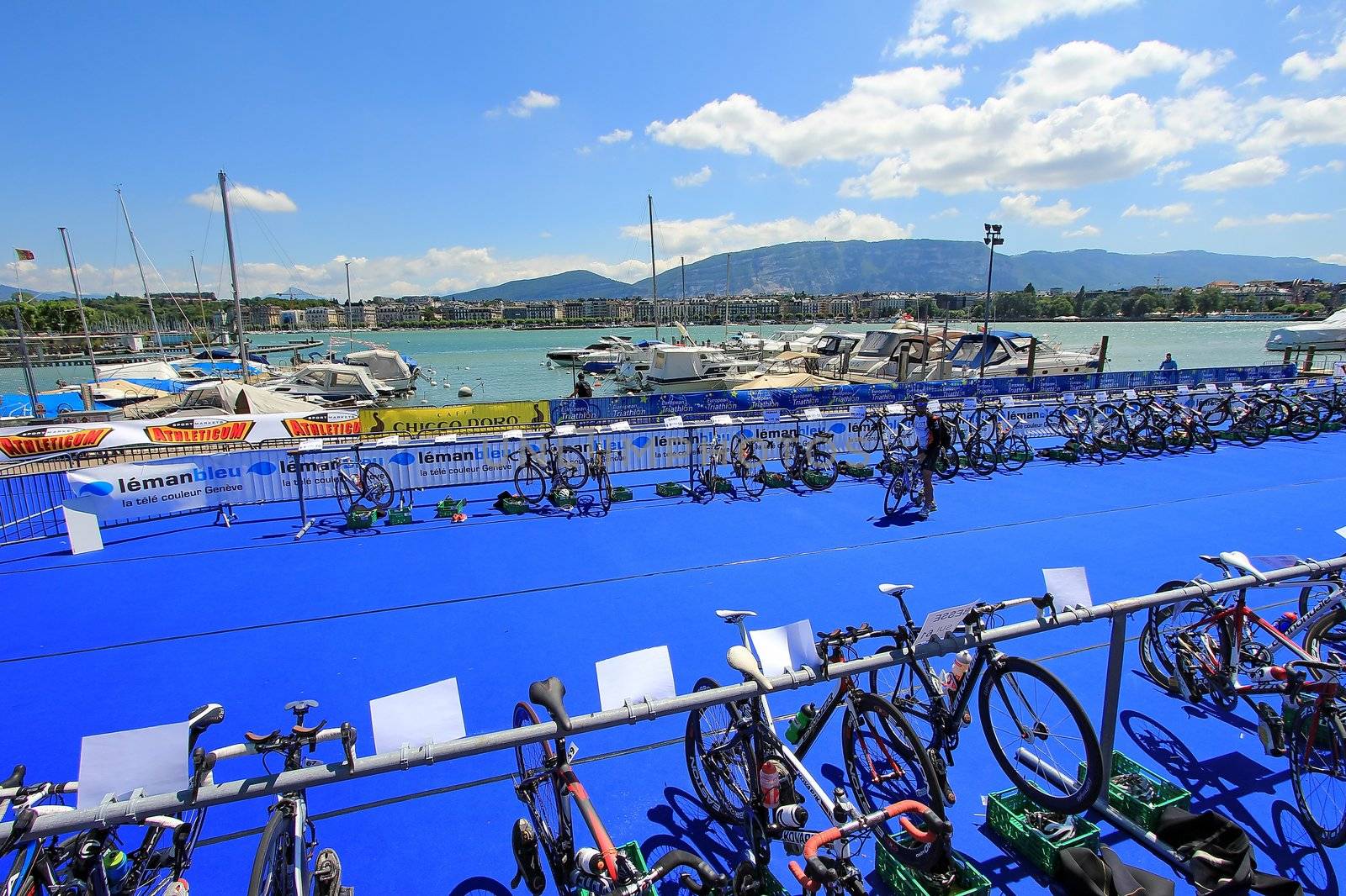 GENEVA, SWITZERLAND - JULY 22 : one unidentified male racing cyclist after the swimm race at the international Geneva Triathlon, on july 22, 2012 in Geneva, 