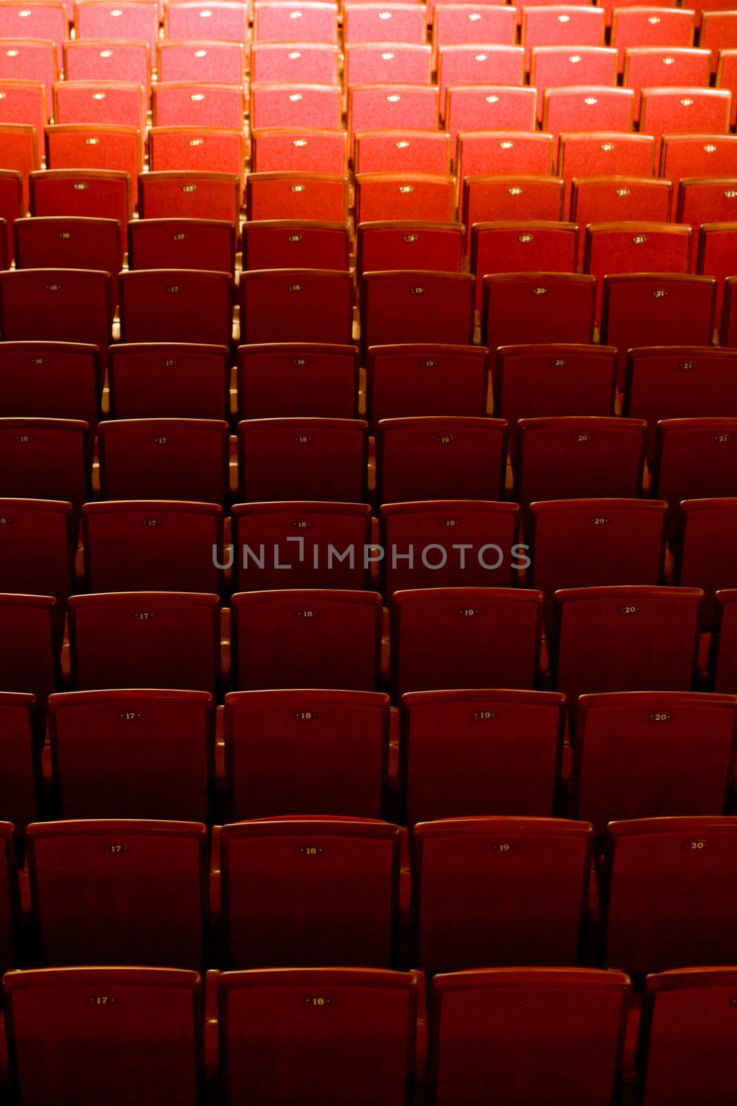 Stock photo: an image of many red seats