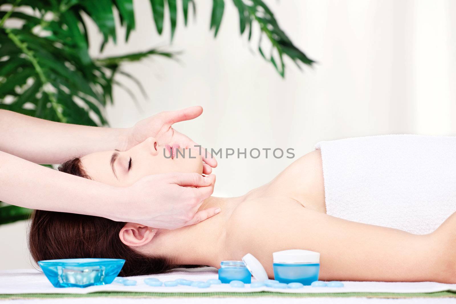 Girl on face massage in salon