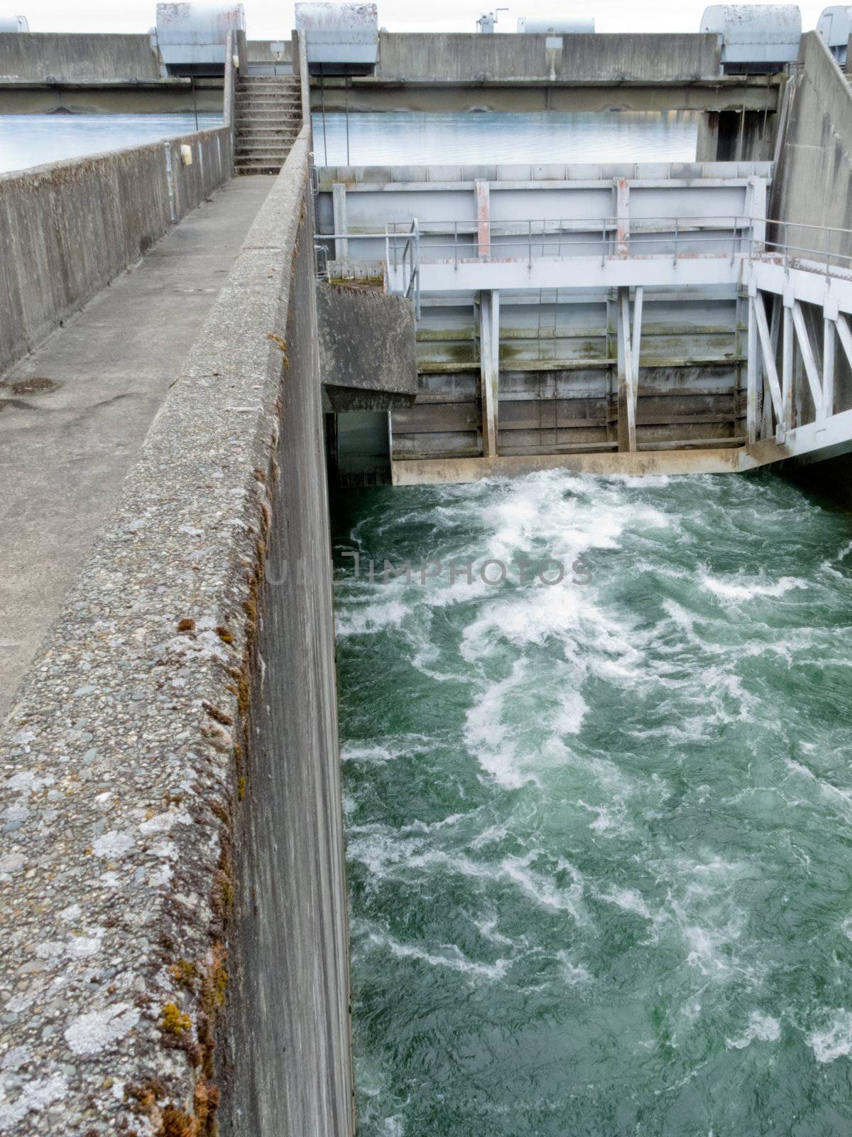 Hydro dam control weir with underneath discharge by PiLens