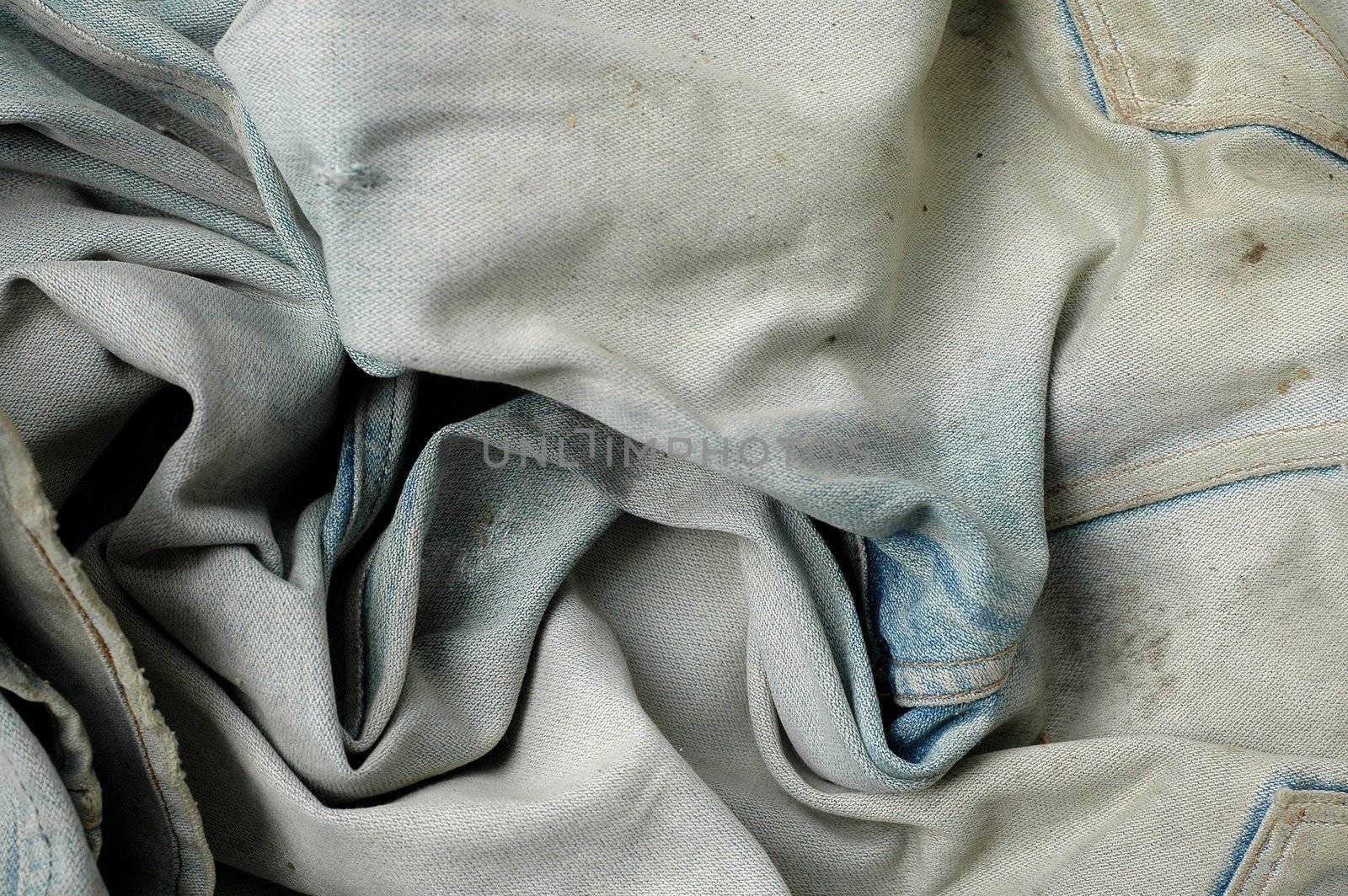 old used jeans trousers closeup