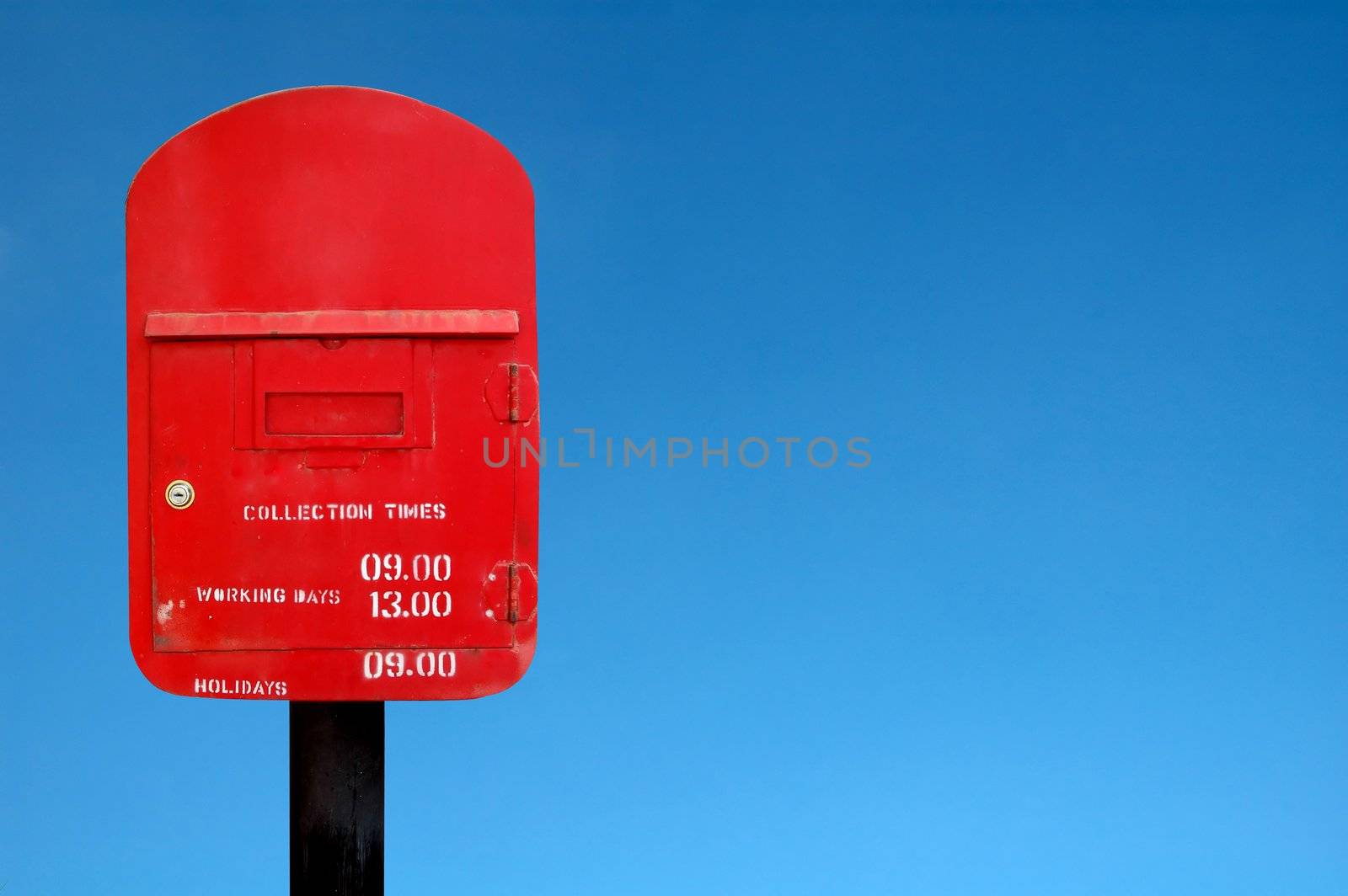 red postbox by anankkml