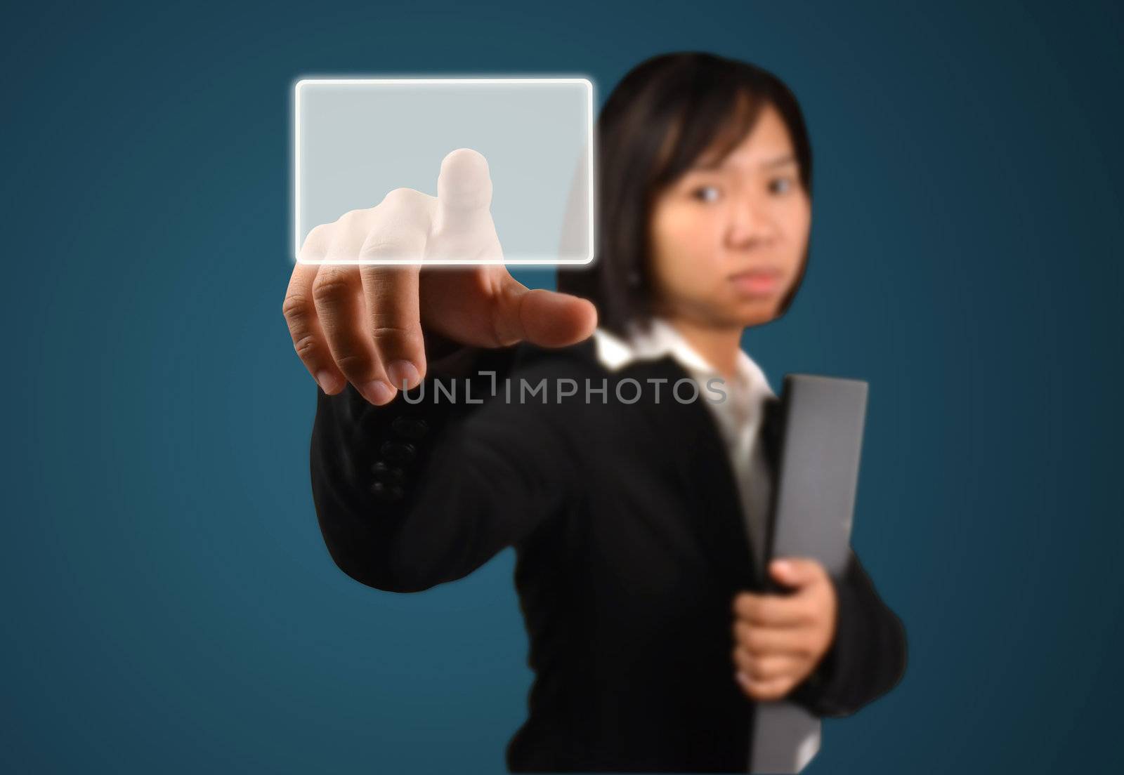 business woman pressing a touch screen interface