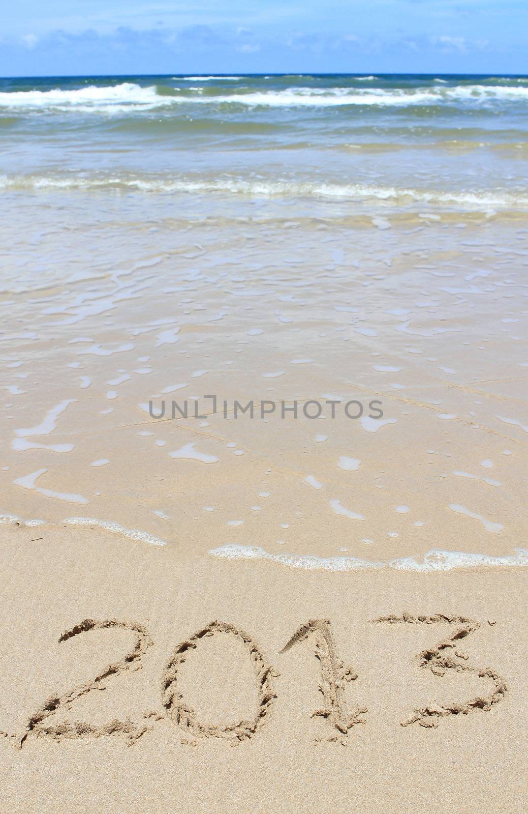 2013 Happy New Year on sea beach 
 by rufous