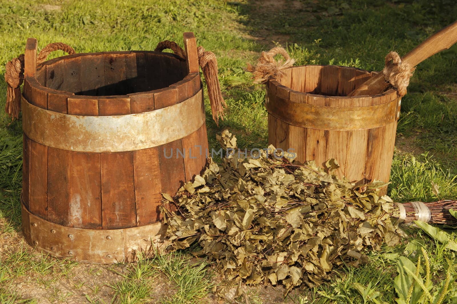 old wooden buckets on the grass