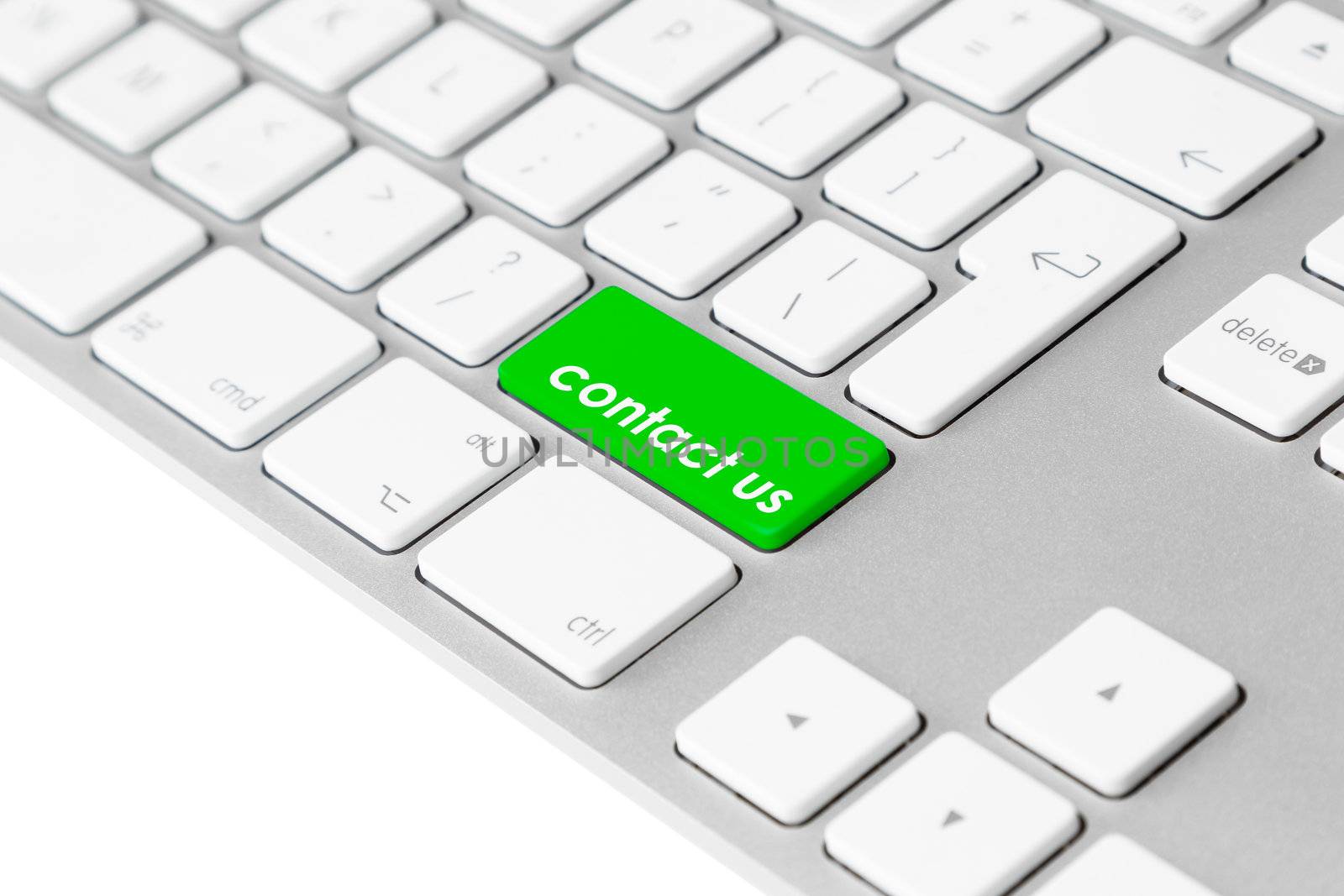 Photo of a computer keyboard with one green key with the words “contact us” symbolising customer and business interaction.