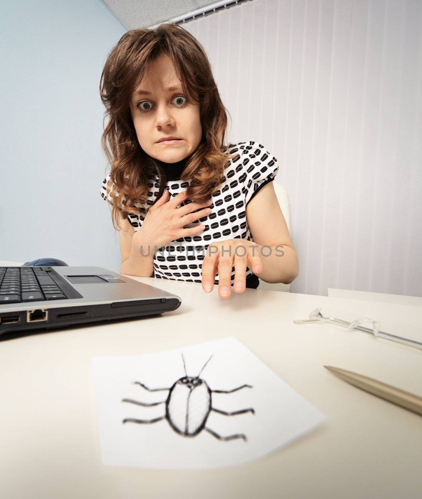 Woman scared cockroach drawn on paper