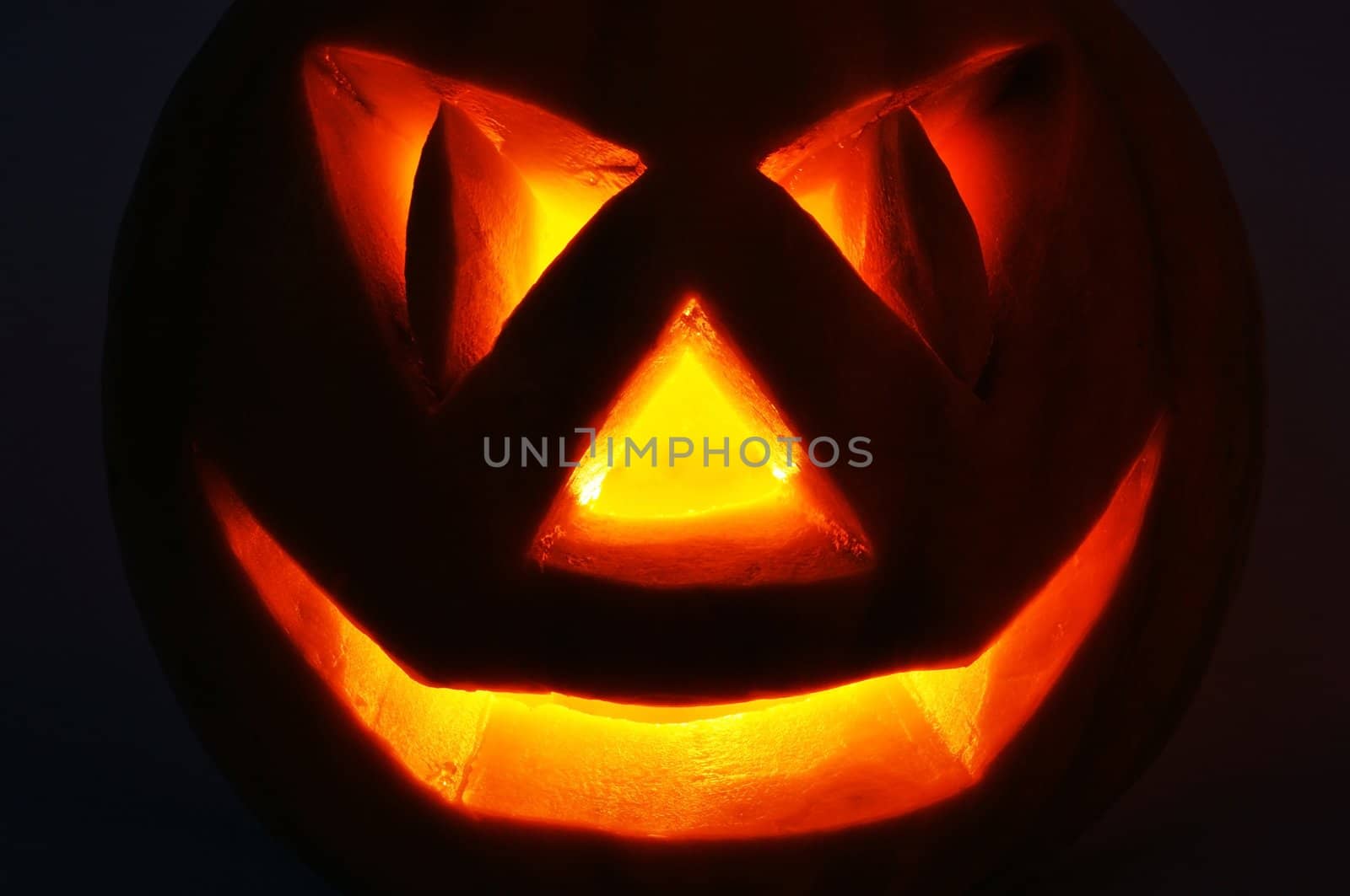 Symbol of a holiday of Halloween: a pumpkin O Lantern on the black. Very terribly :)