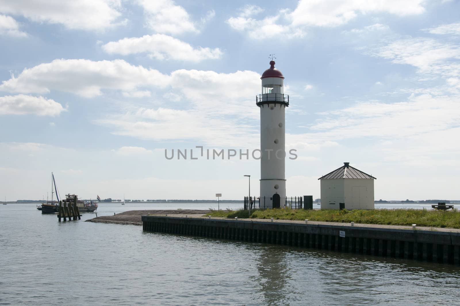 the lighthouse in  Hellevoetsluis holland by compuinfoto