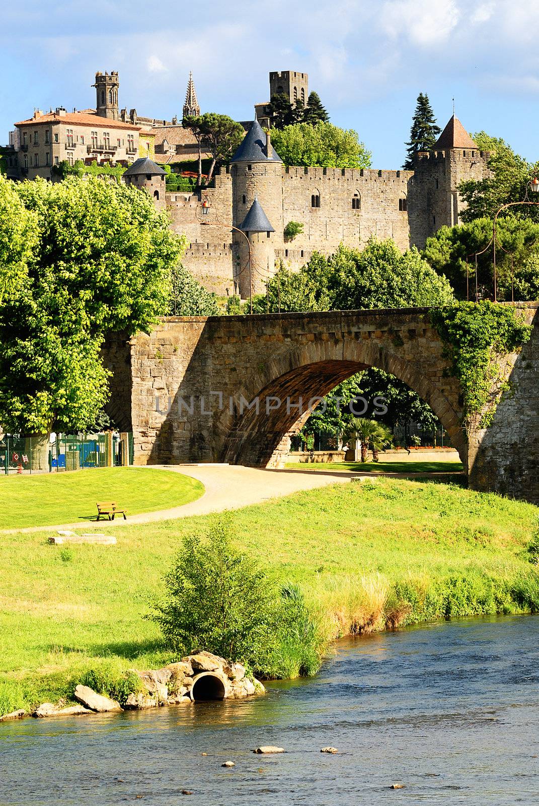 View of fortress Carcassonne (France, Languedoc), river Aude and Old bridge 