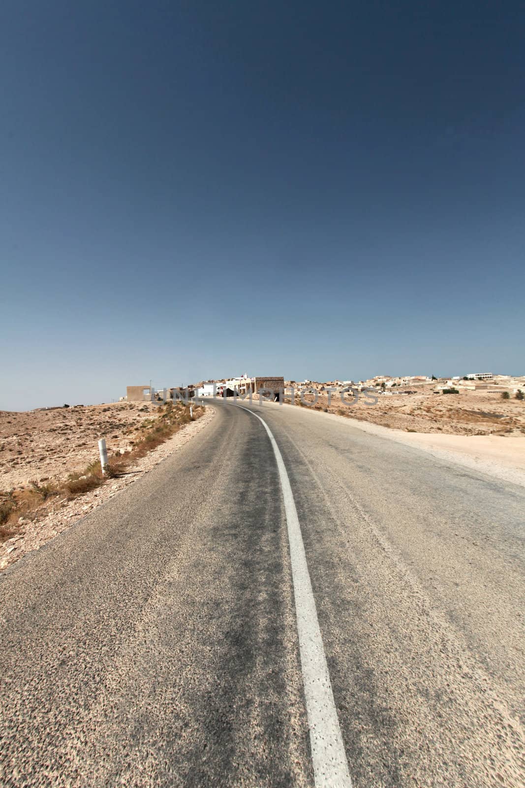 Deserted highway through the desert in Tunisia