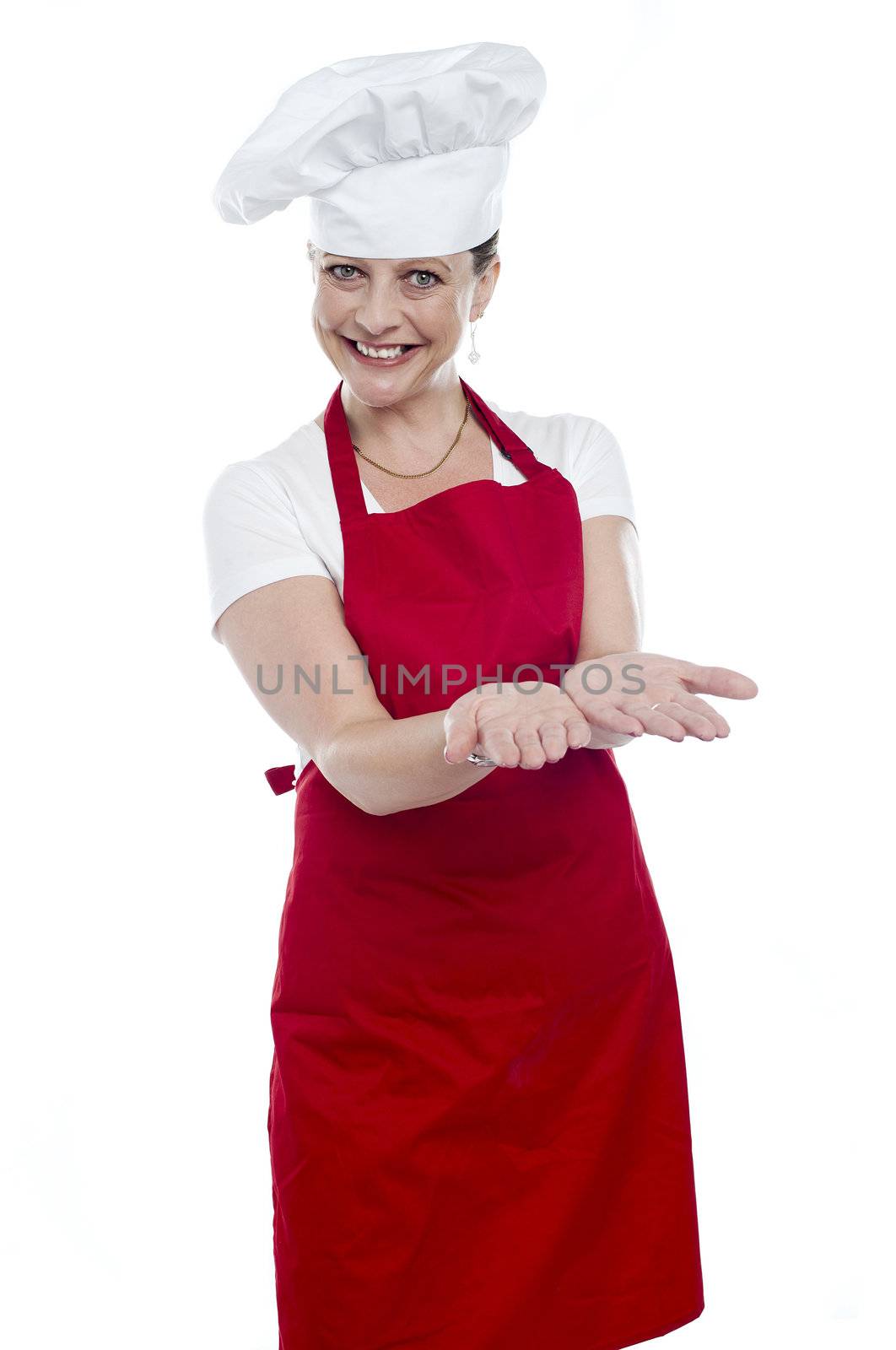 Female chef with open palms against white background