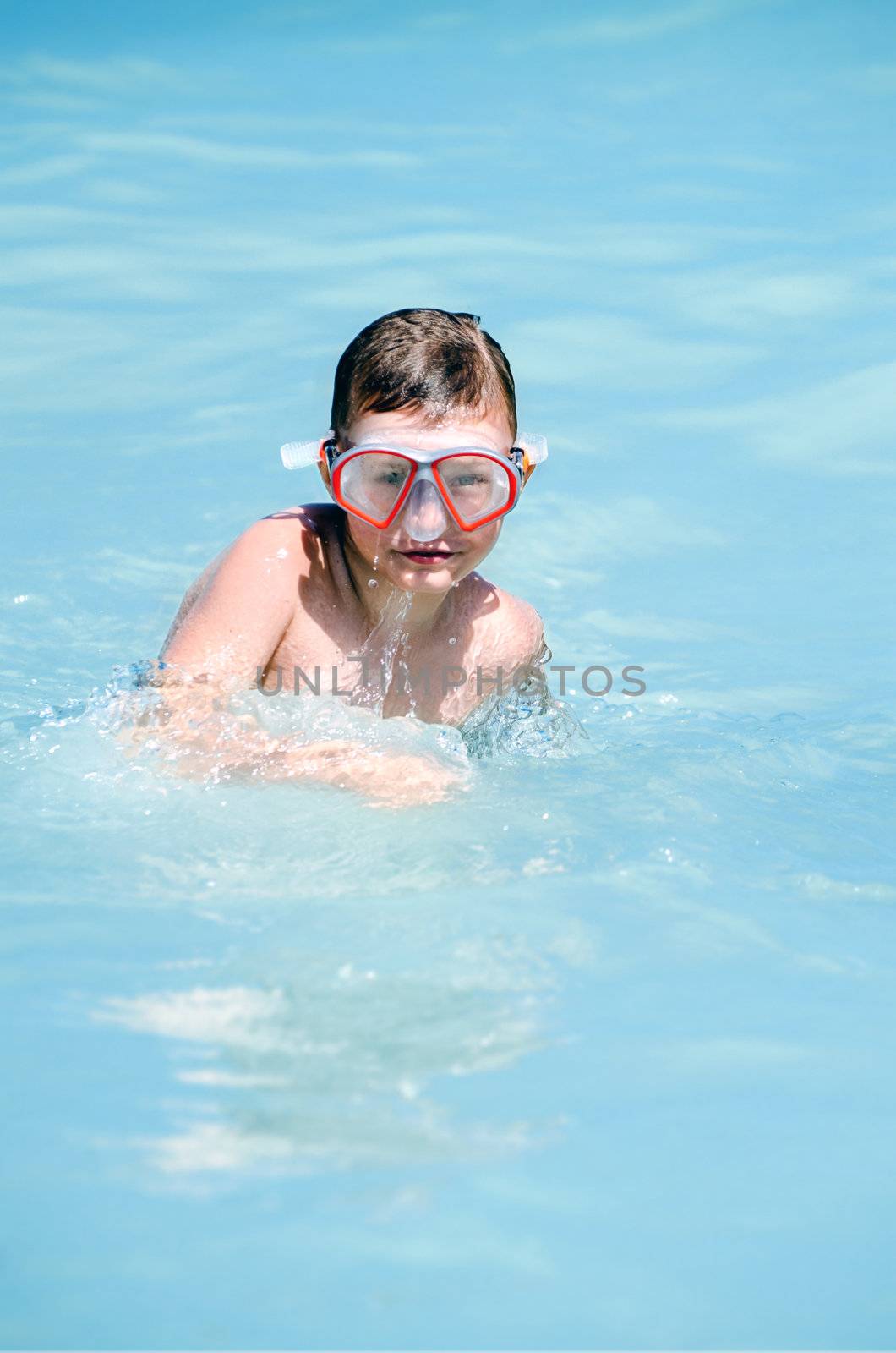 Child playing in water by silent47