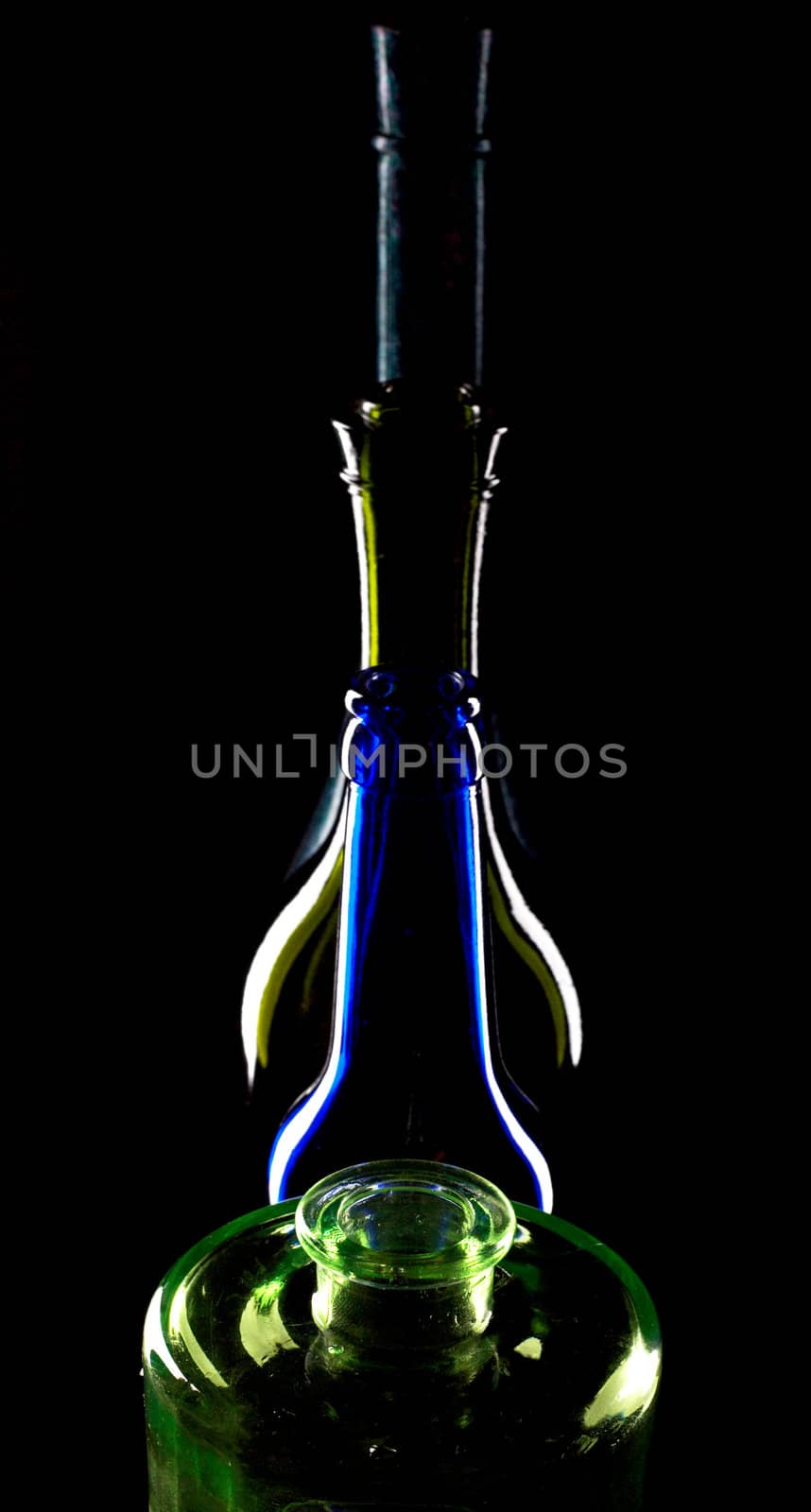 Bottles of wine on black background by velkol