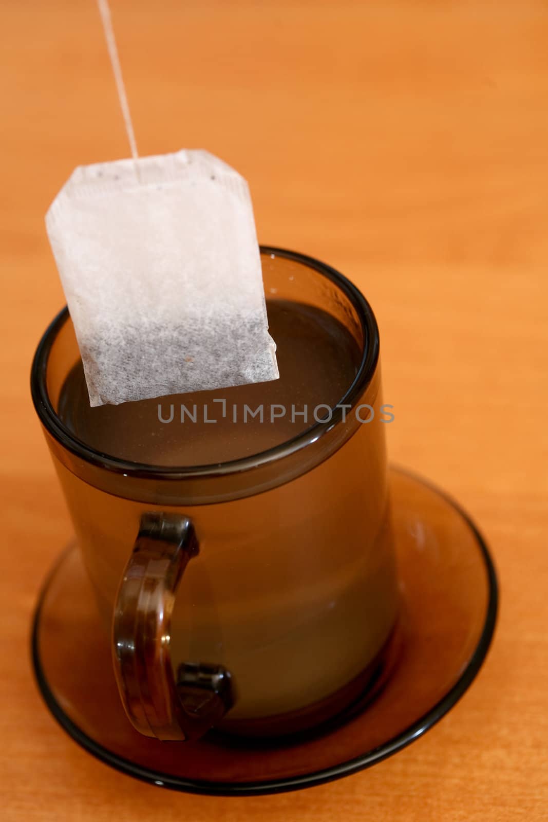 An image of tea bag and cup