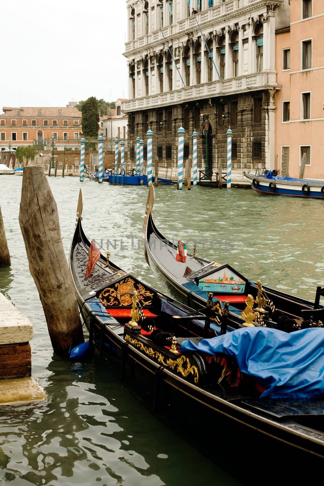 An image of two gondolas in Venice