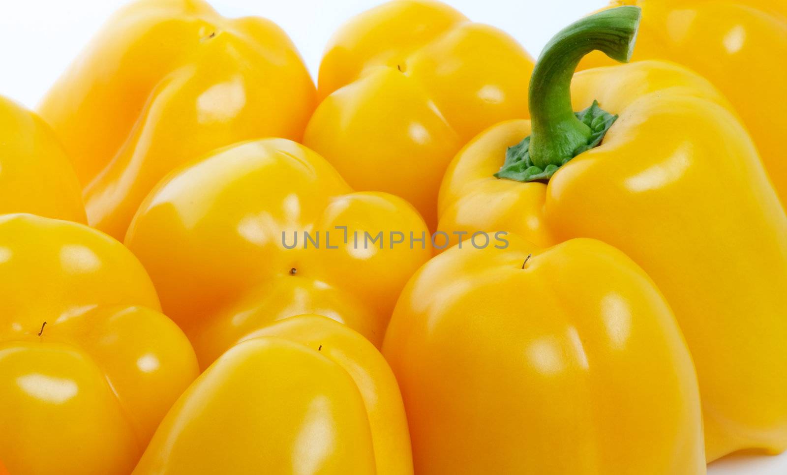 Yellow Bell Peppers close up on white background
