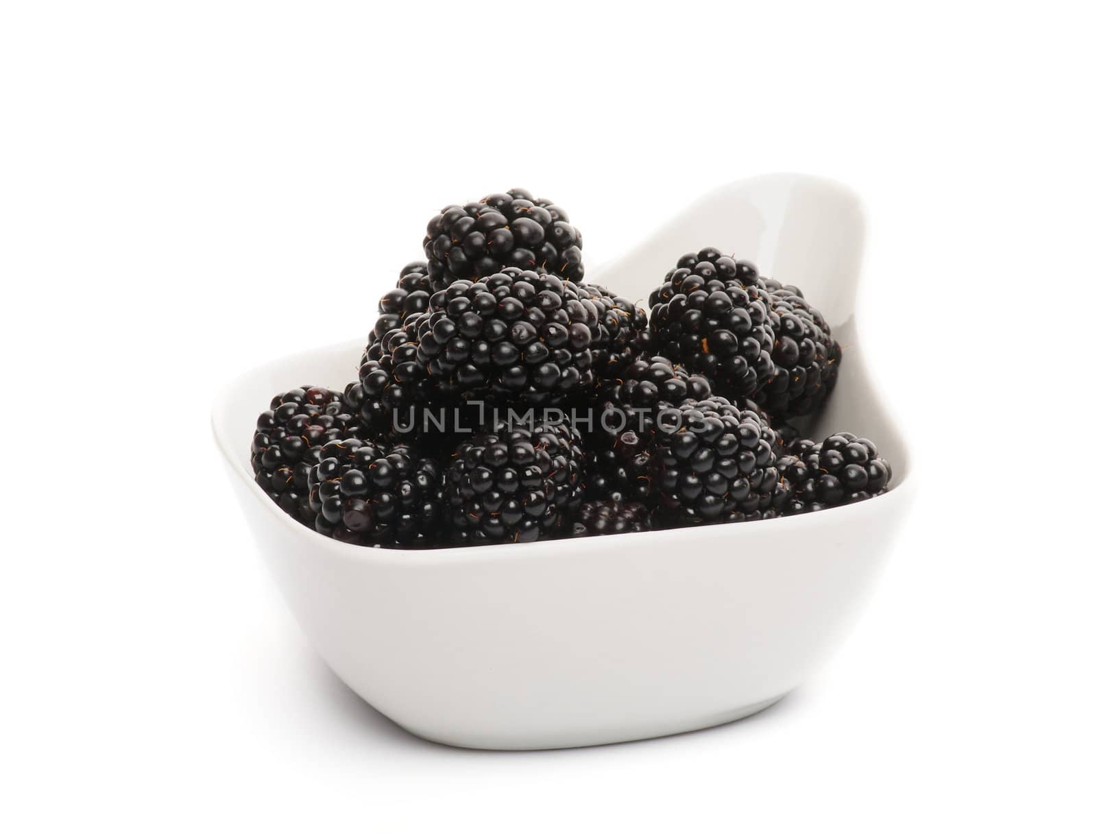Perfect Blackberries in White Bowl isolated on white background 