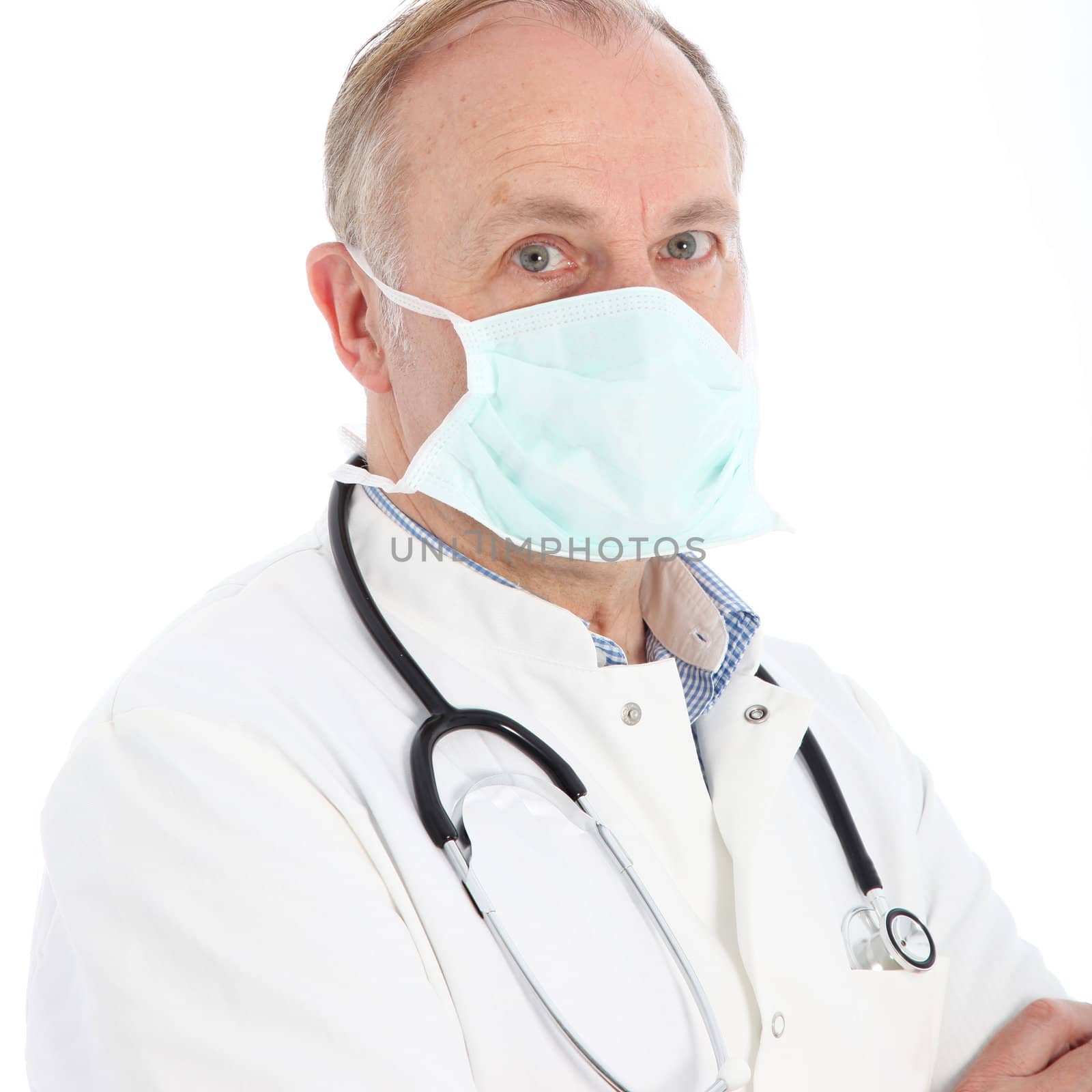 Serious senior surgeon or medical doctor wearing a mask and stethoscope isolated on white 