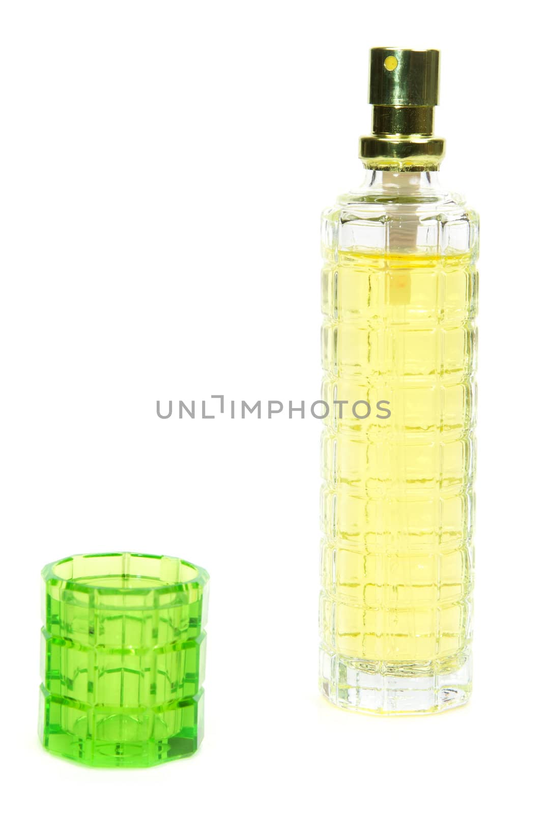 Yellow perfume bottle isolated on white background