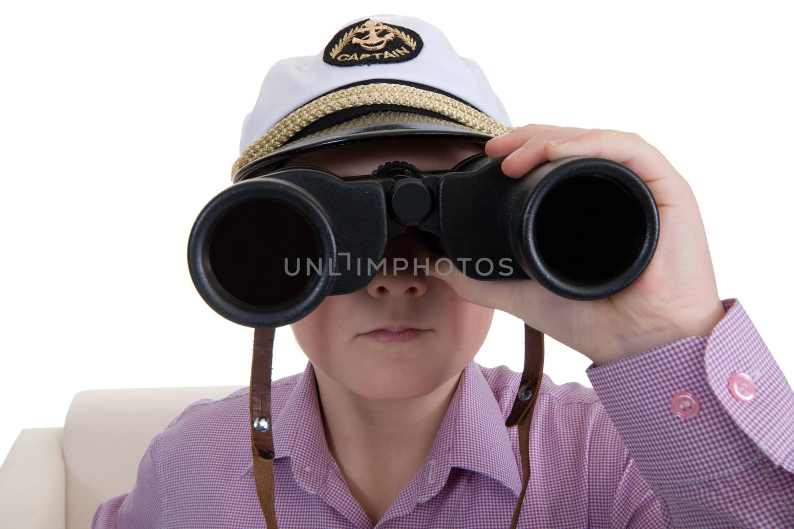 Strict boy with glasses and a cap Captain