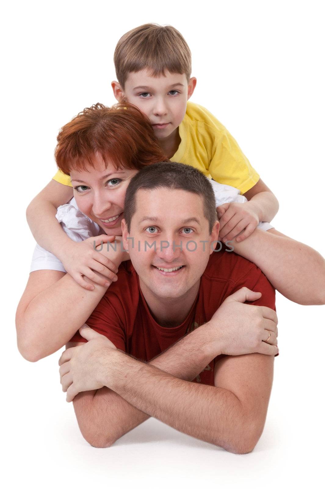 Mom and Dad and son lying on a white background