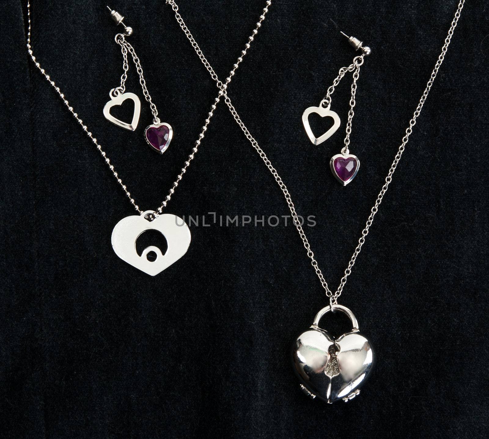 Necklace with sparkling stones on dark fabric