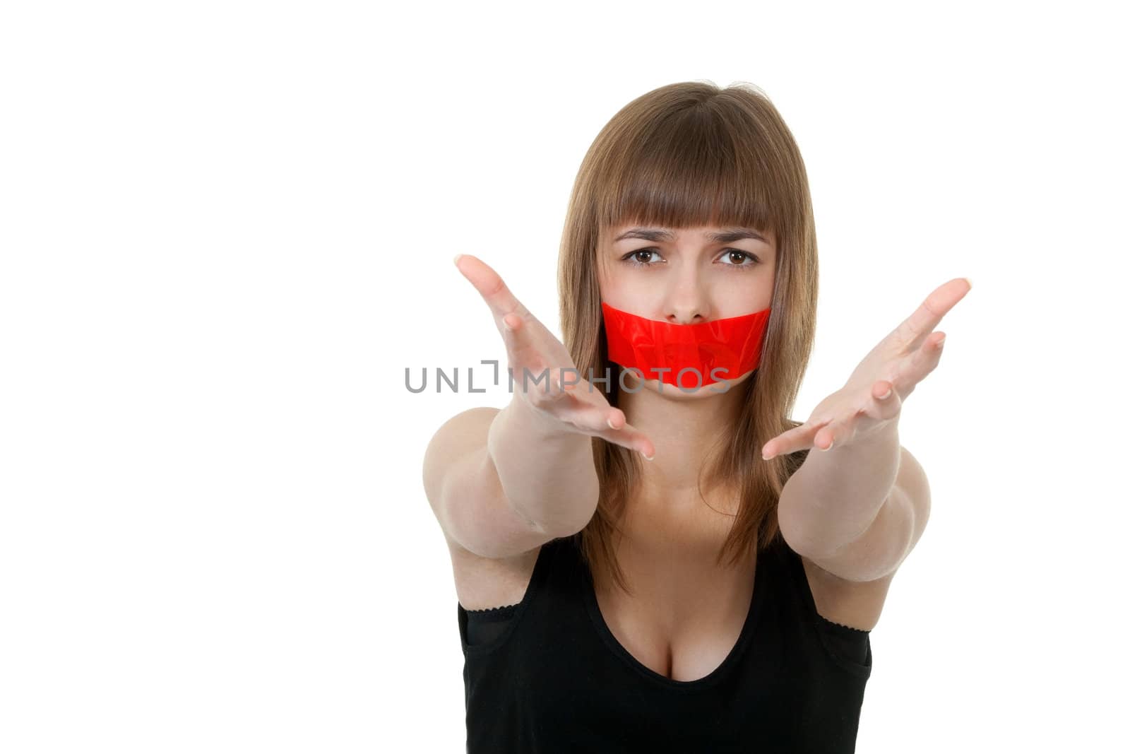 beautiful girl with her mouth sealed with red tape