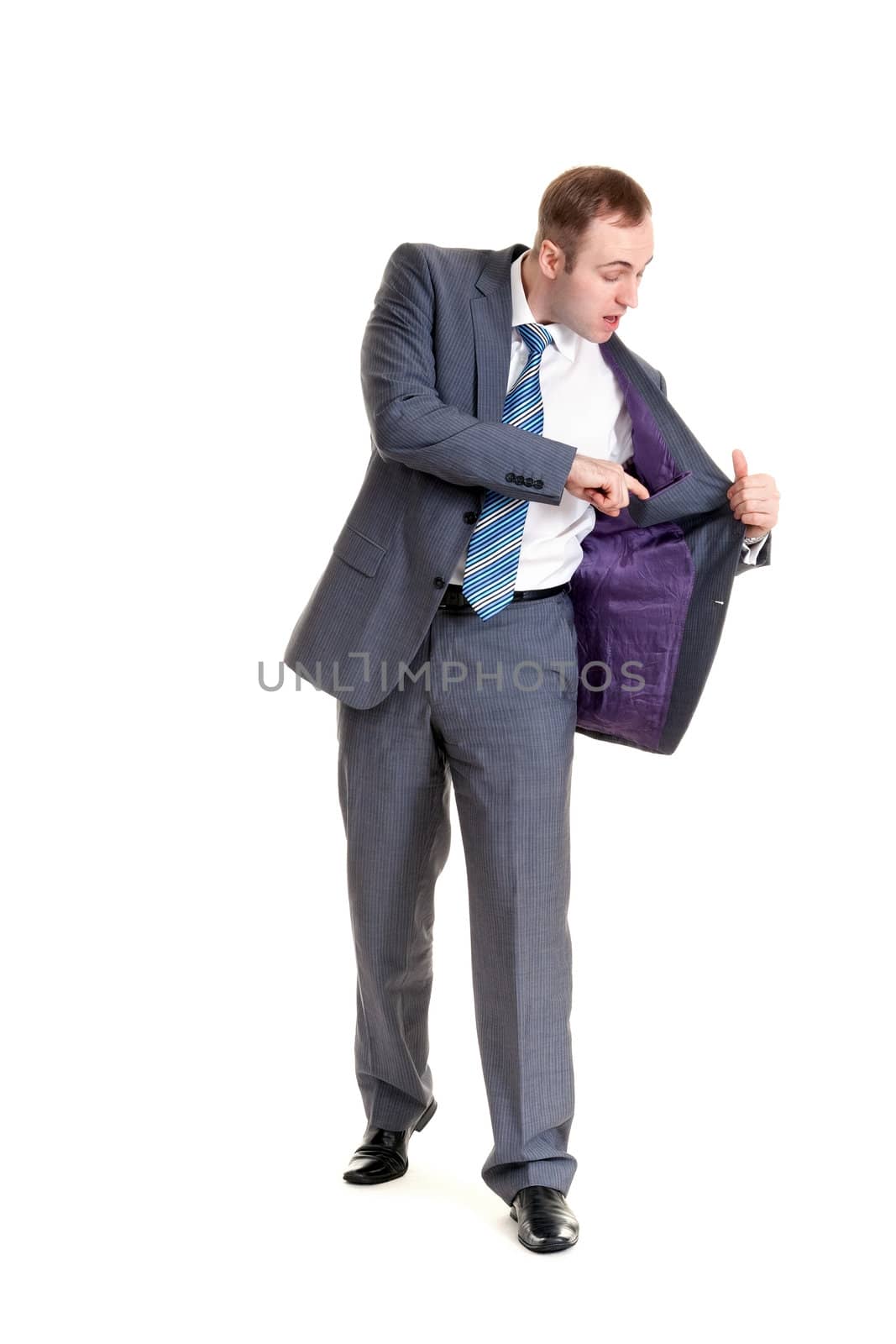 businessman looking at his jacket pocket on a white background