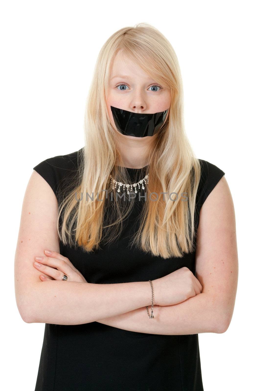beautiful girl with her mouth sealed with black tape