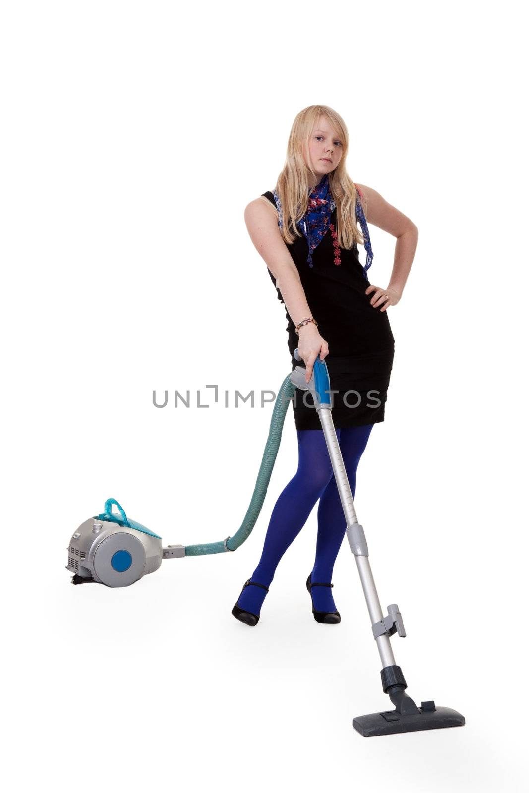 The girl in blue tights with a vacuum cleaner
