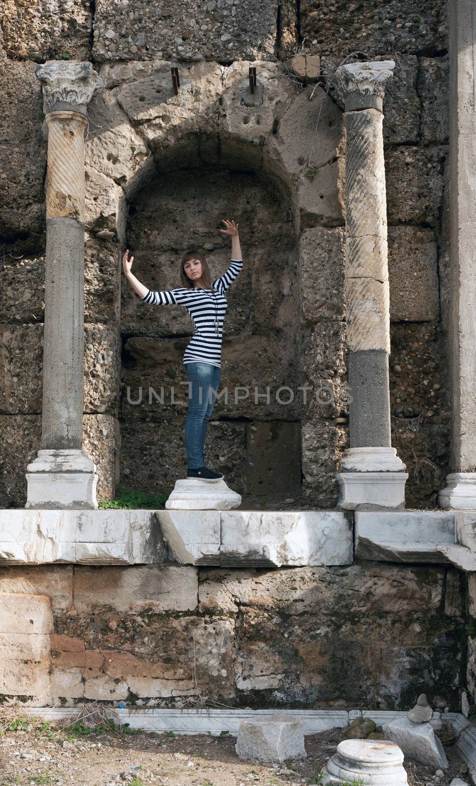 The girl in the ruins of the statue depicts