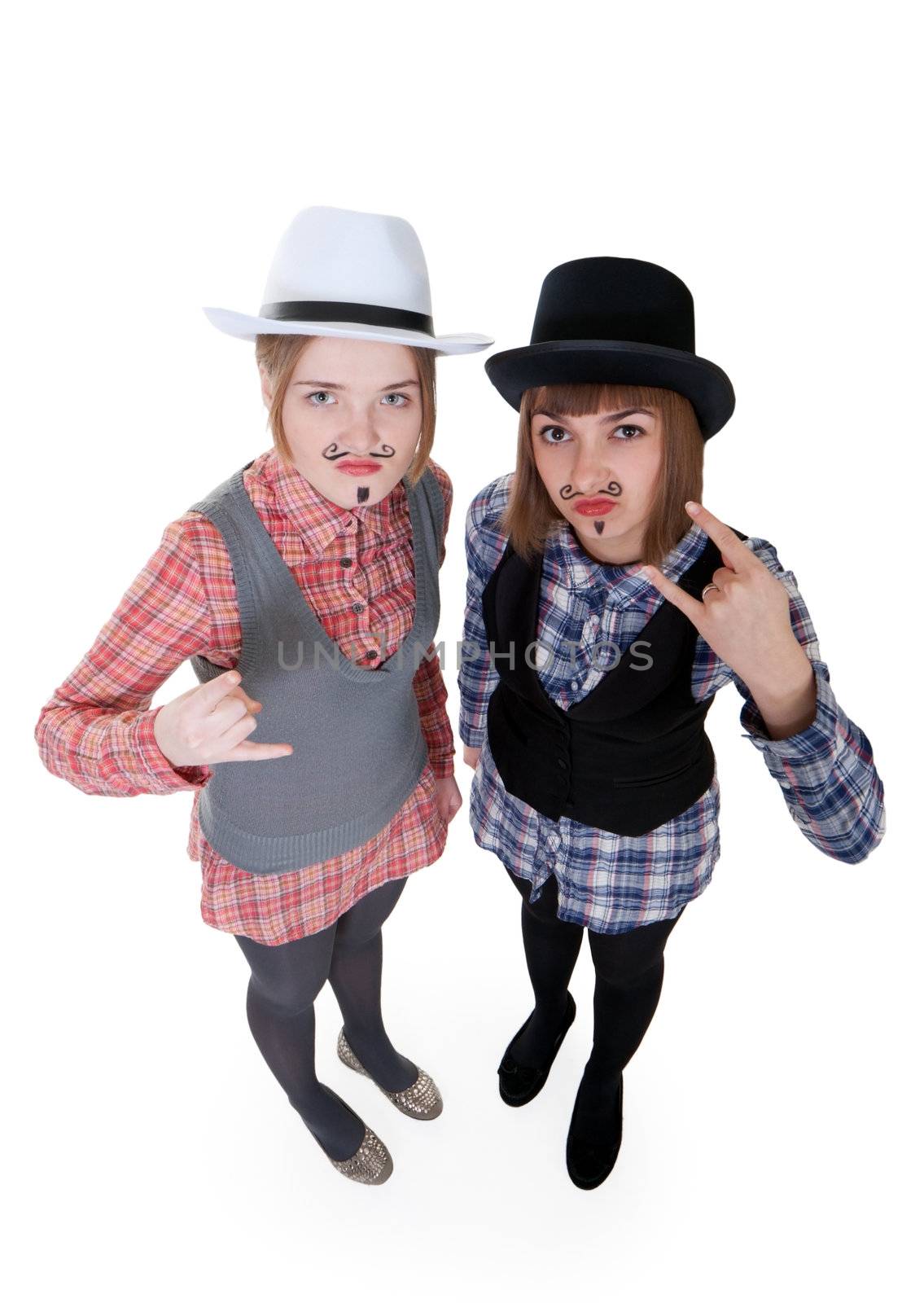 Two girls with painted mustaches and bowler hats on white background