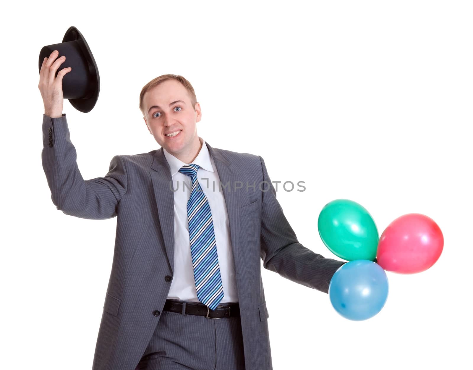 businessman in a black hat with inflatable colored balls