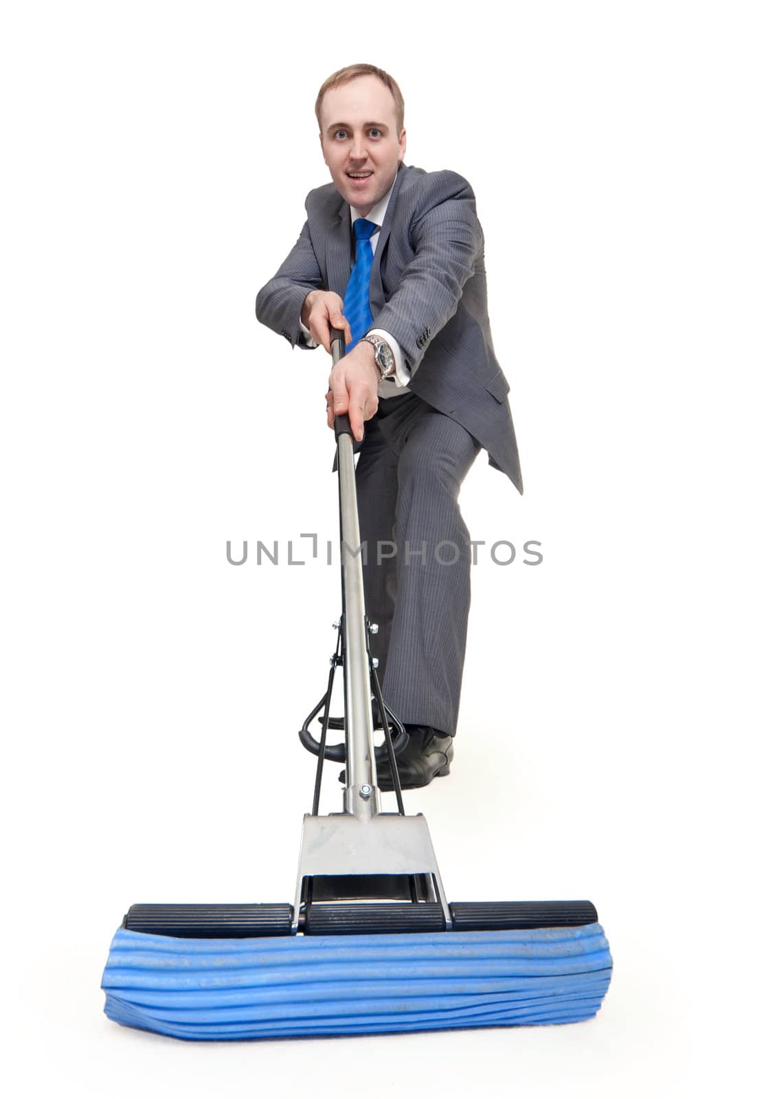 businessman with a mop washes the floor on a white background