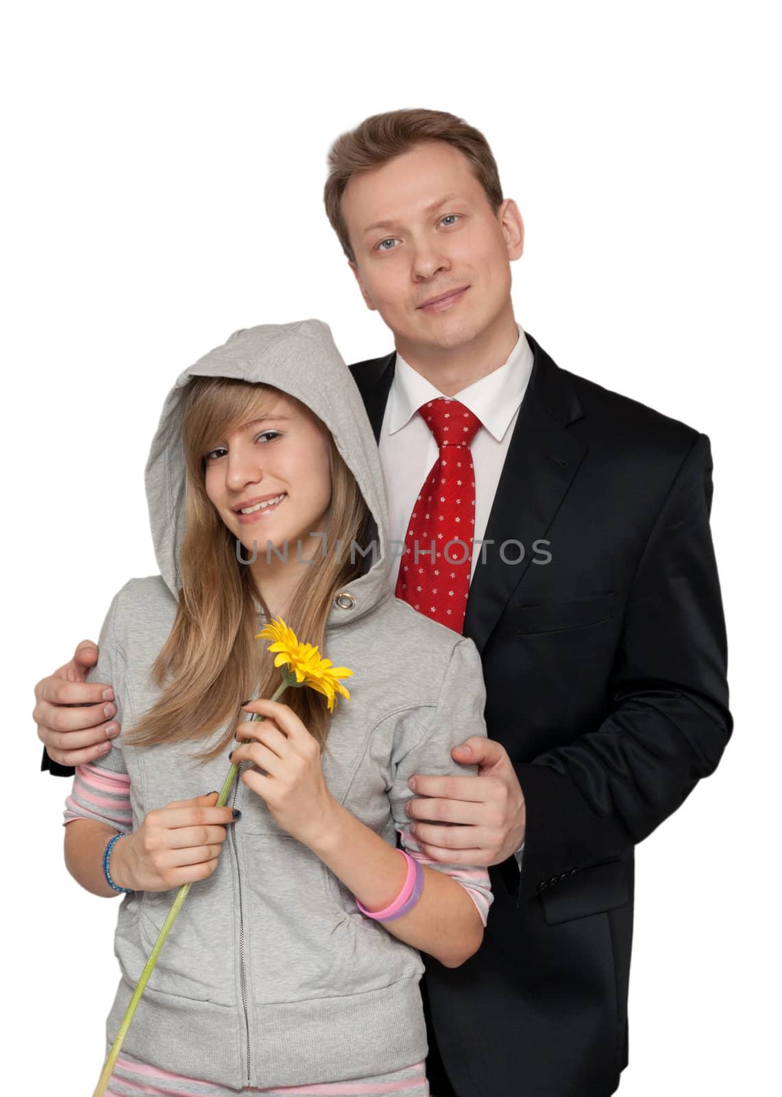 Dad in a suit and tie with a teenage daughter