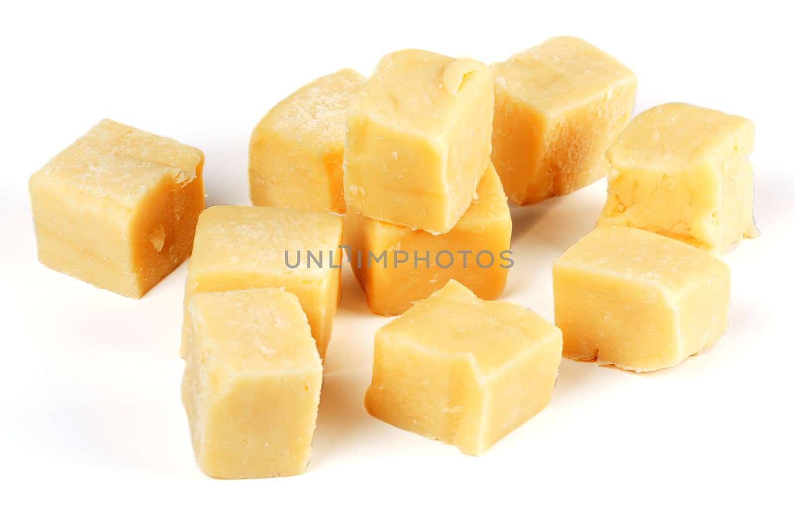 aged cheese, sliced isolated on a white background