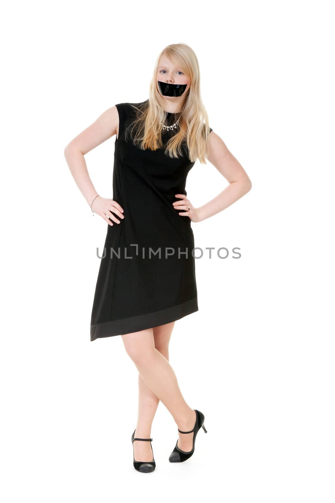 beautiful girl with her mouth sealed with black tape