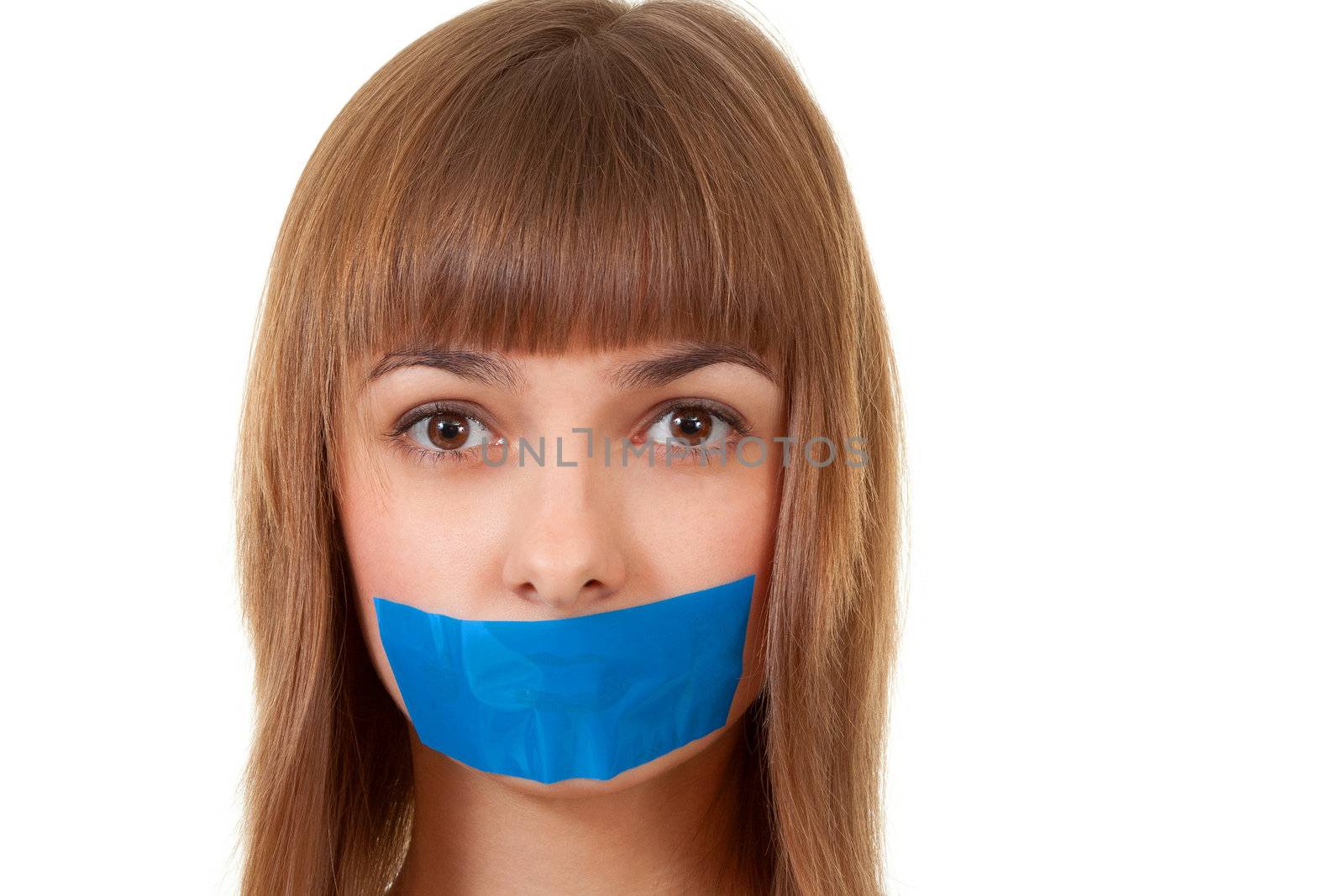 beautiful girl with her mouth sealed with blue tape