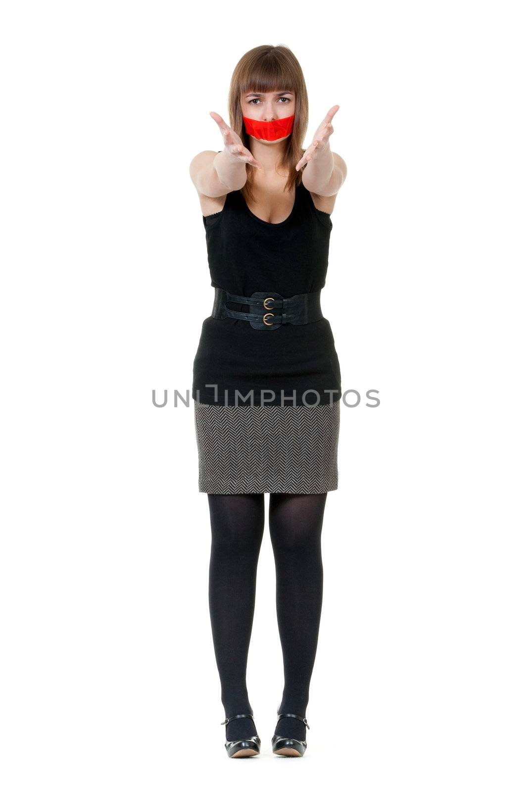 beautiful girl with her mouth sealed with red tape
