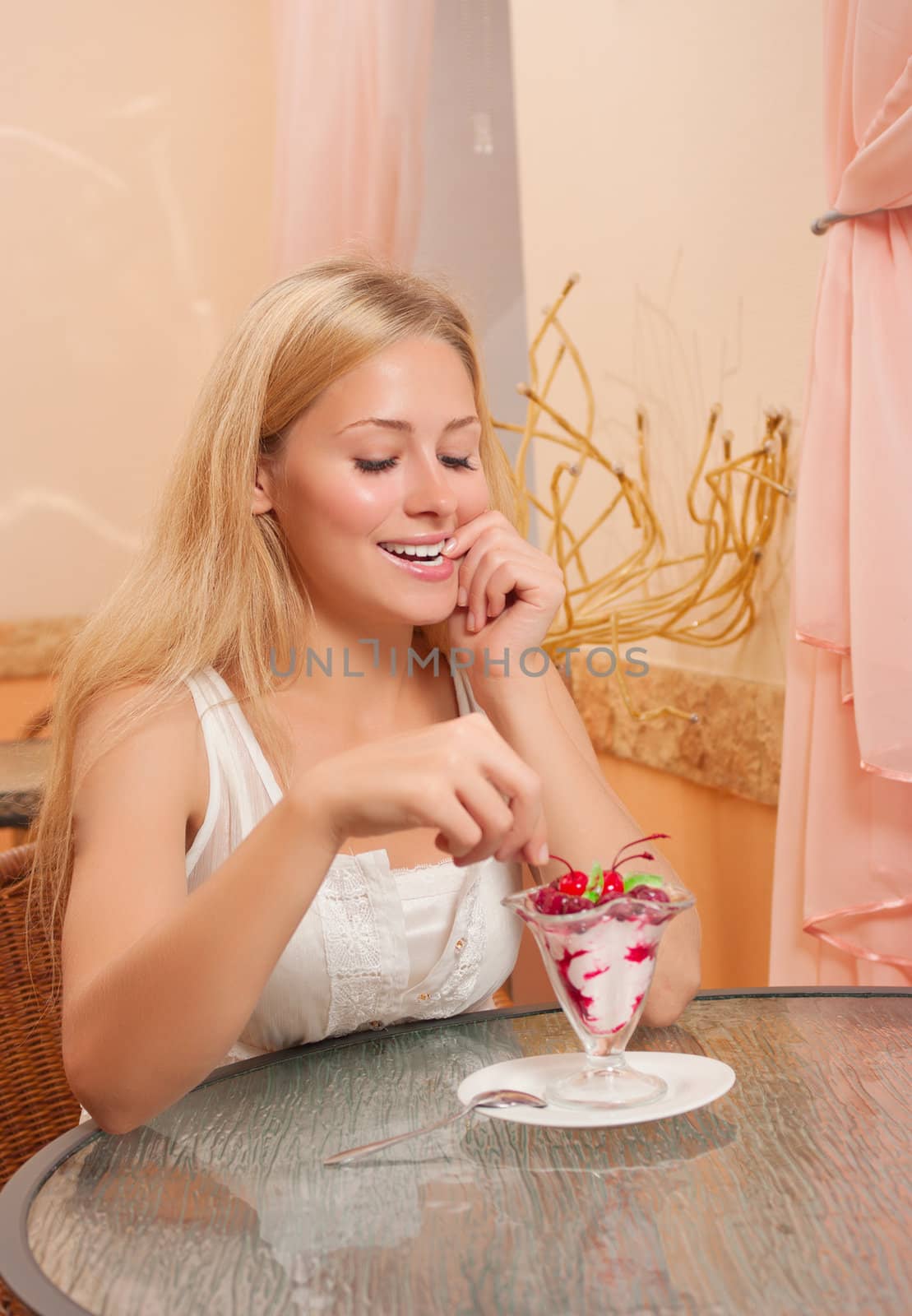 Young woman in cafe eat dessert