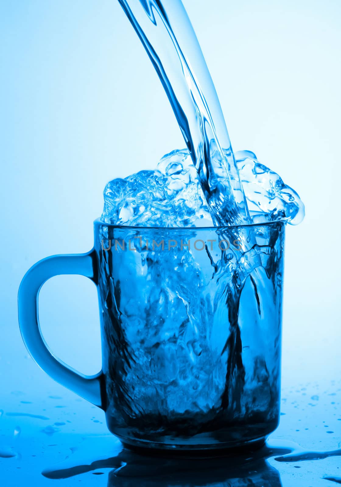 Stock photo: food theme:image of water splash in glass