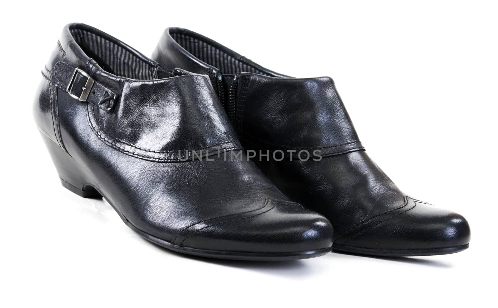 pair of black leather women's shoes on a white background