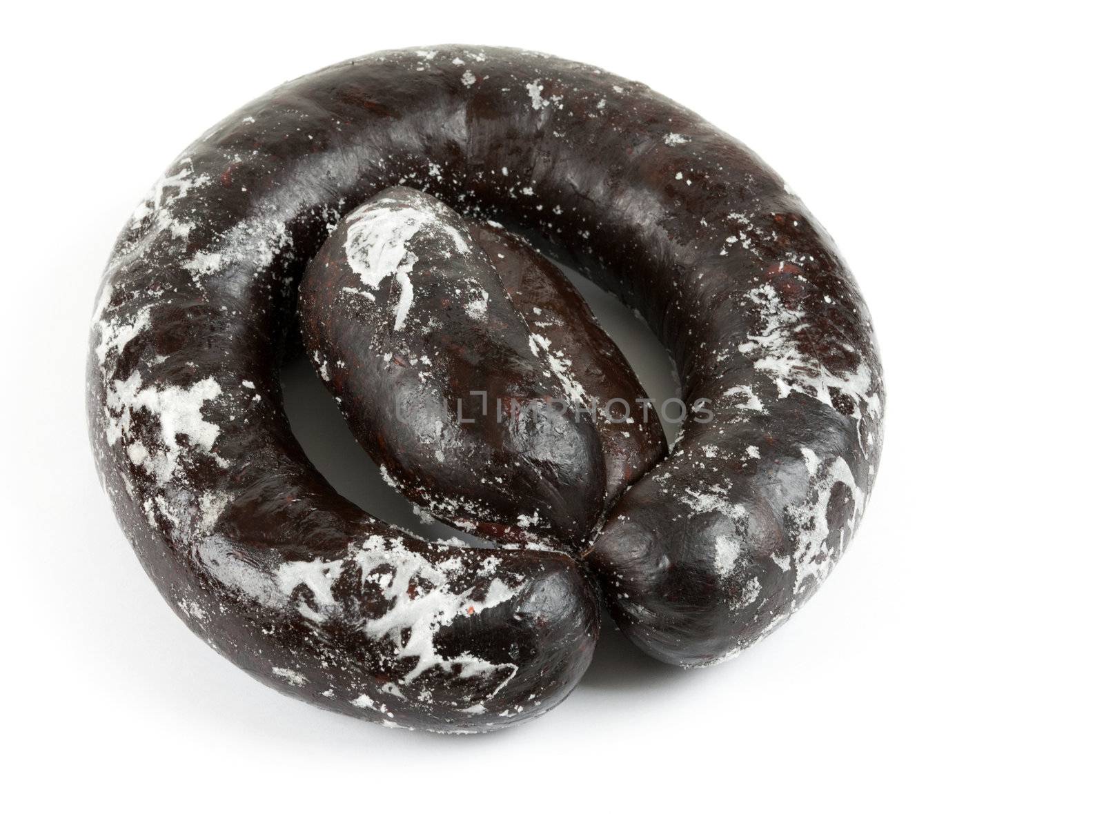 Frozen blood sausage ring on a white background